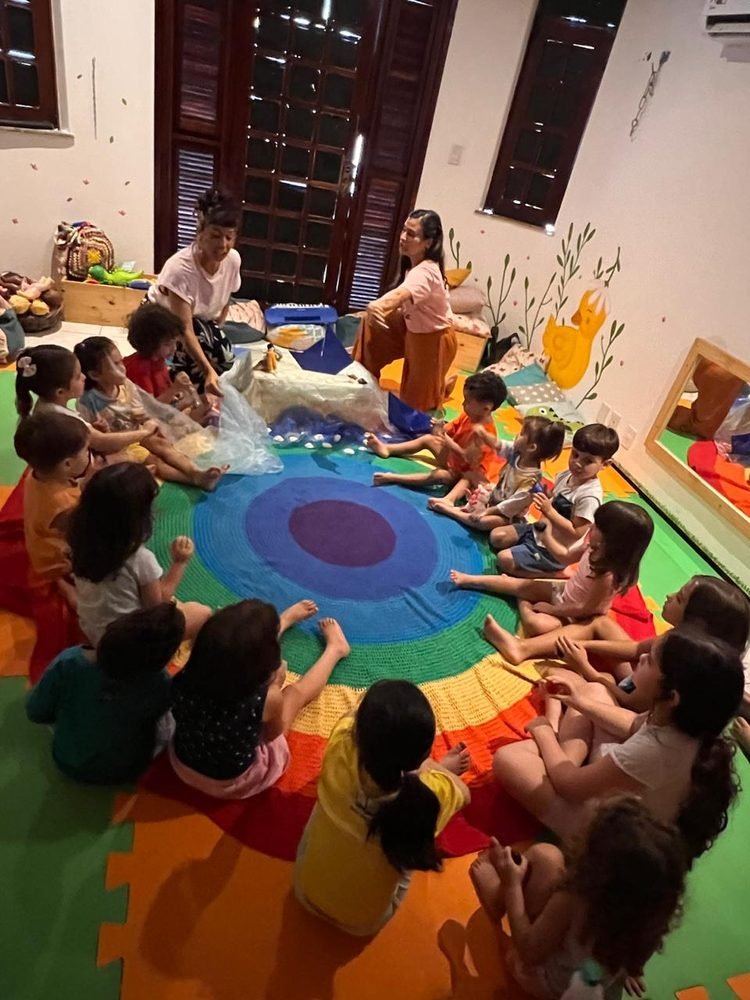 Roda de contação de histórias com as crianças da educação infantil do Novo Brincar